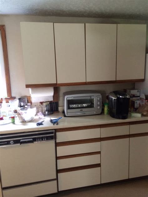 stainless steel appliances with 1980s laminate cabinets|80s white cabinets.